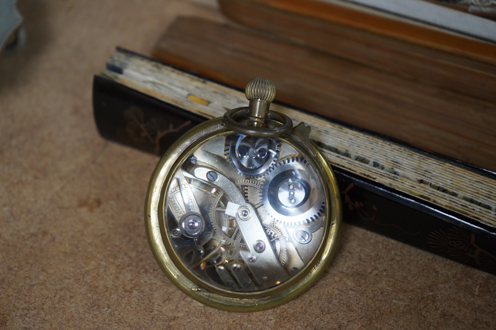 A French paste-mounted globular desk timepiece, 7cm in diameter